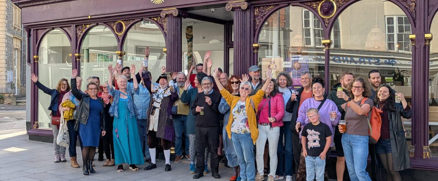 Group of people stood outside the Exmouth Healing Centre building